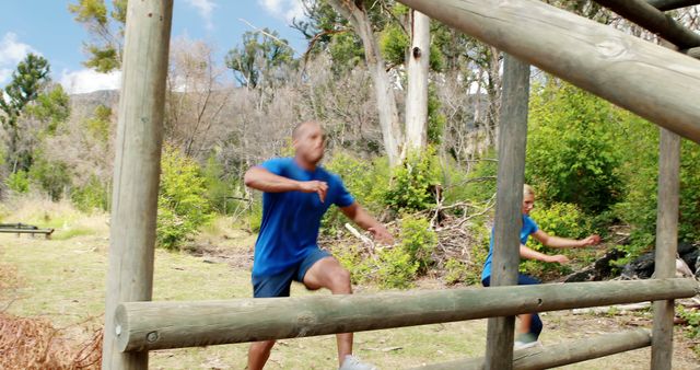 Athletes Overcoming Obstacle Course Outdoors - Download Free Stock Images Pikwizard.com