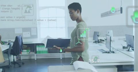 Woman Reviewing Data Binder with Augmented Analytics HUD in Open-Plan Office