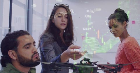 Diverse Team Analyzing Financial Data with Drone Innovation