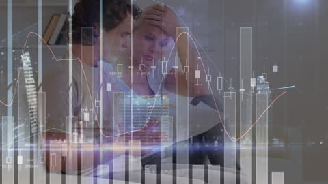 Couple Analyzing Data on Tablet with Digital Overlay