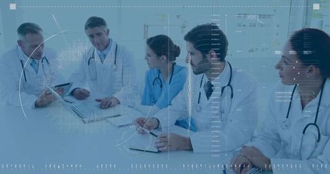 Doctors Analyzing Patient Data with Technology Overlays in Conference