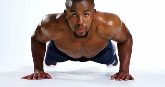 Determined Athlete Focused on Intense Push-Up Session - Download Free Stock Images Pikwizard.com