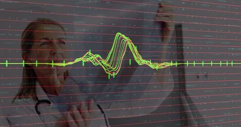 Doctor Analyzing Medical Data with Overlayed Waveform Display - Download Free Stock Images Pikwizard.com