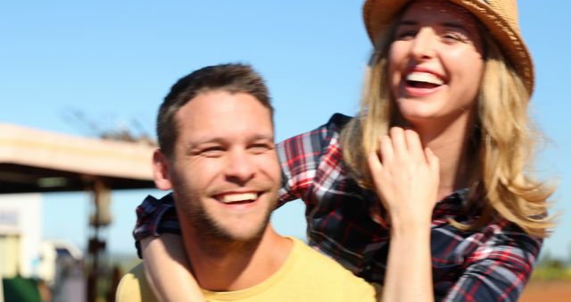 Smiling Young Couple Enjoying Outdoor Sunshine - Download Free Stock Images Pikwizard.com