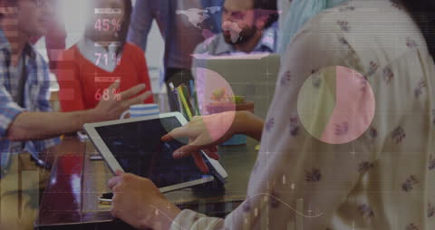 Business Team Discussing Data Analytics with Tablet in Modern Office