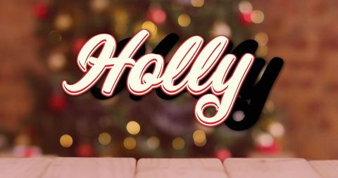 Festive Holly Text with Blurred Christmas Tree Background - Download Free Stock Images Pikwizard.com