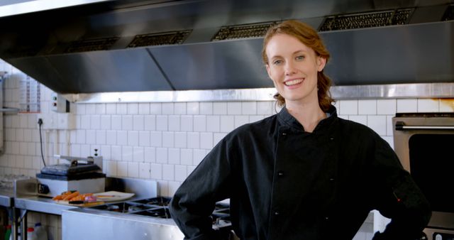 Confident Female Chef in Professional Kitchen with Modern Equipment - Download Free Stock Images Pikwizard.com