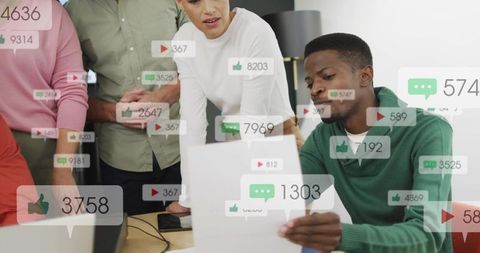 Collaborative team analyzing social media metrics with digital engagement overlays