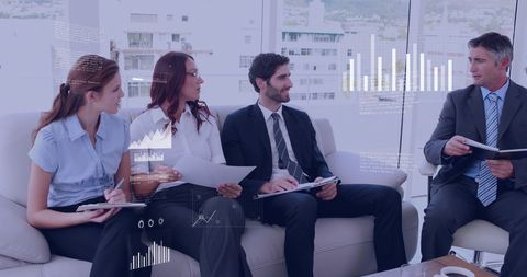 Business Team Analyzing Data with Interface Overlay in Corporate Office