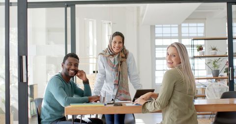 Diverse Team Enjoying Productive Office Environment - Download Free Stock Images Pikwizard.com