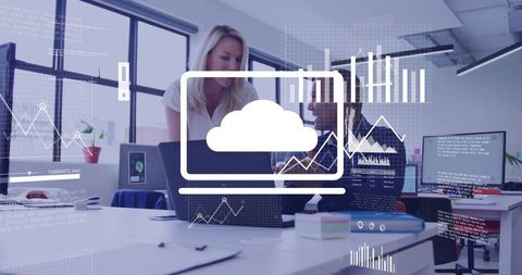 Business team collaborating over cloud analytics dashboard on laptop, reviewing charts