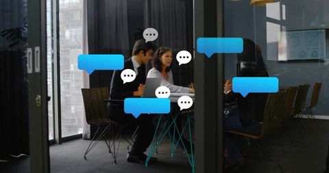 Business Professionals Engaging in Strategic Discussion in Modern Boardroom