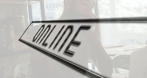 Casual Professional Working Online in Modern Workspace