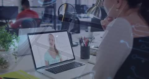 Woman Engaged in Virtual Tech Conference with Circuitry Effects