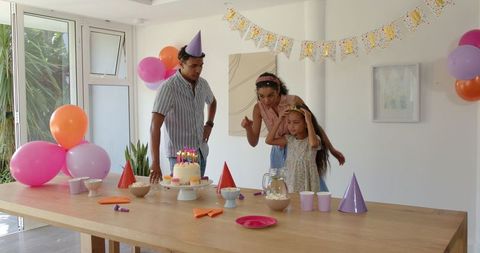 Family Enjoys Celebratory Birthday Moment at Home