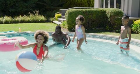 Family Bonding Time in Backyard Pool on Sunny Summer Day