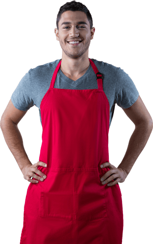 Happy male waiter in red apron standing with hands on hips transparent