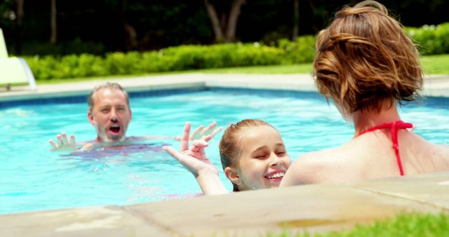 Family Enjoying Refreshing Swim in Backyard Pool on Sunny Day - Download Free Stock Images Pikwizard.com