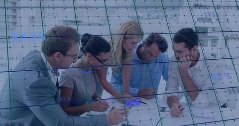 Business team collaborating over financial charts and analytics with digital data overlay