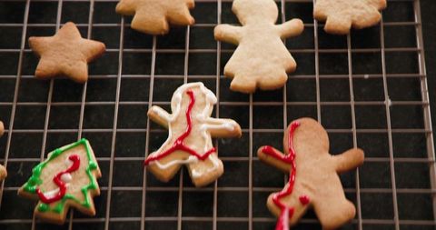 Festive Gingerbread Cookies Cooling with Red and Green Icing