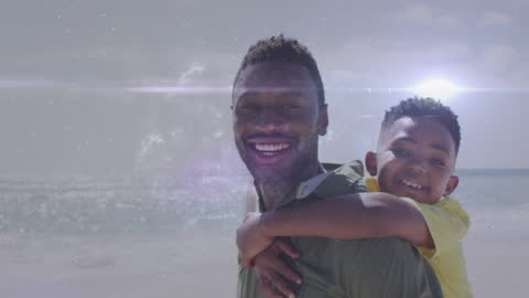 Father and Son Enjoying Fun Day at the Beach