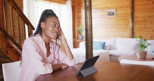 Young Woman Engaging in Video Call at Home - Download Free Stock Images Pikwizard.com