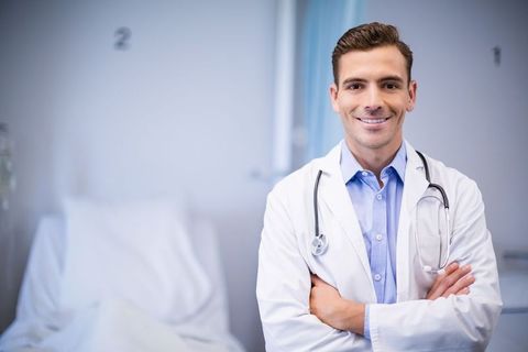 Confident Male Doctor in Hospital Room - Download Free Stock Images Pikwizard.com