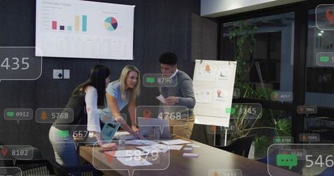 Business team collaborating and reviewing analytics with AR overlays, dashboards and charts