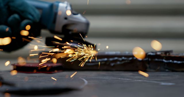 Close Up of Electric Grinder Producing Sparks in Workshop - Download Free Stock Images Pikwizard.com