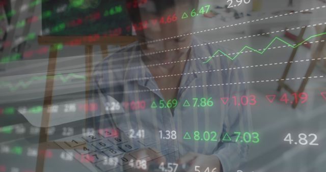 Image depicts business person analyzing stock market data on transparent screen with digital charts. Useful for illustrating financial analysis, investment planning, economic trends, corporate strategy, and market research.