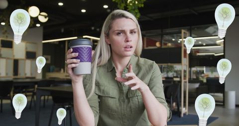 Businesswoman Video Calling with Creative Lightbulb Overlay