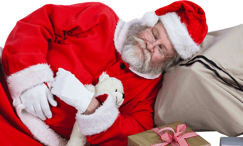 transparent santa claus sleeping beside gift box during christmas season - Download Free Stock Videos Pikwizard.com
