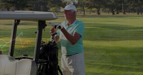 Senior golfer adjusting club beside golf cart on sunlit fairway during morning play