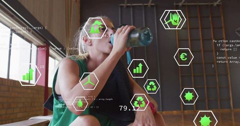 Woman drinking water after workout using reusable bottle with fitness data overlays