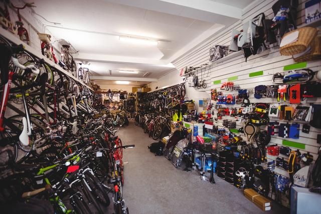 Different types of bicycles and accessories in workshop