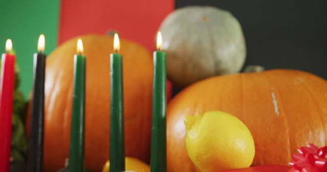 Kwanzaa Candles and Fresh Produce with Pumpkins in Background - Download Free Stock Images Pikwizard.com