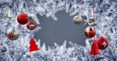 Festive christmas baubles and silver fir branches