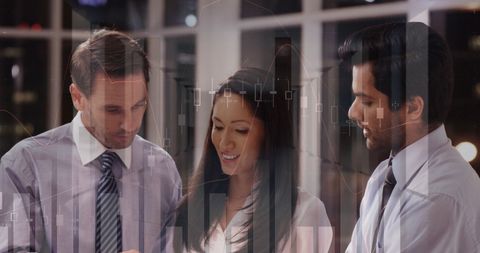 Diverse Business Professionals Analyzing Financial Data Visualization