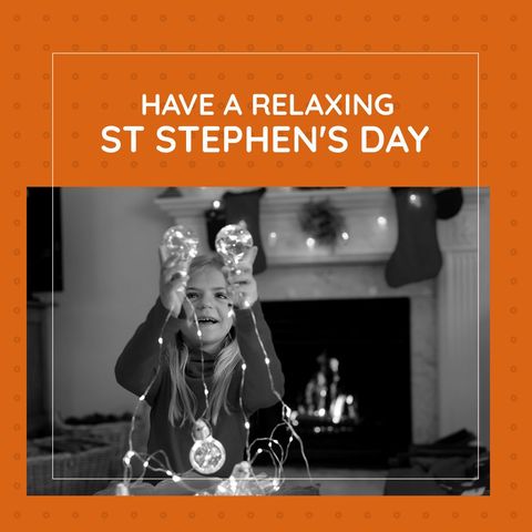 Joyful girl celebrating st stephen's day by christmas fireplace