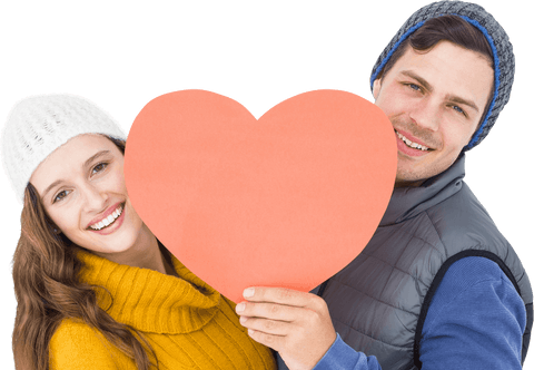 Happy Couple Holding Large Heart in Winter Clothing on Transparent Background