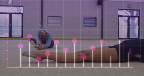 Adult athlete stretching with child in studio with fitness data overlay for training
