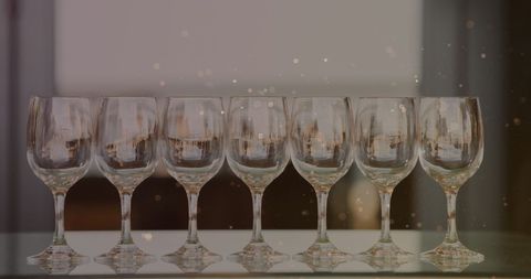 Elegant Wine Glasses Highlighted by Soft Golden Lights - Download Free Stock Images Pikwizard.com