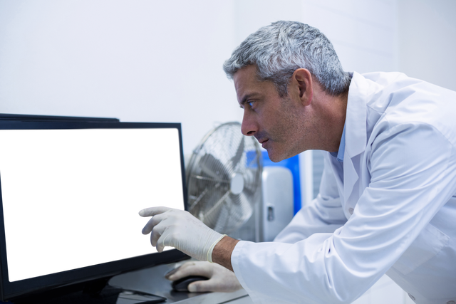 Transparent thoughtful dentist examining x-ray on monitor in clinic - Download Free Stock Videos Pikwizard.com