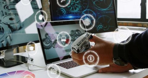 Caucasian businessman innovating with digital interface in modern office