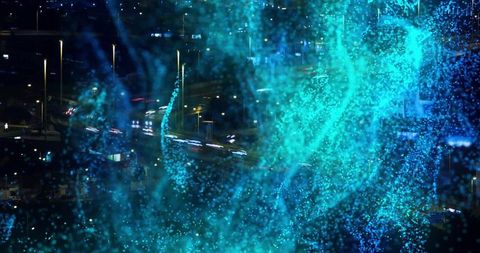 Swirling Turquoise Particle Cloud Over Urban Highway with Neon Car Light Trails at Night