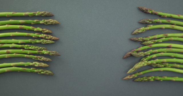 Fresh Green Asparagus Spears on Solid Grey Background - Download Free Stock Images Pikwizard.com