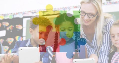 Teacher guiding students using tablets with colorful jigsaw overlay, classroom edtech collaboration