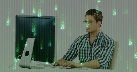 Programmer businessman engaged in insightful coding under binary rain