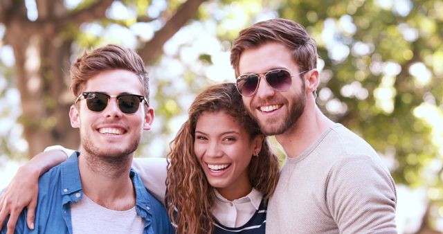 Smiling Friends in Sunglasses Enjoying Outdoor Gathering - Download Free Stock Images Pikwizard.com