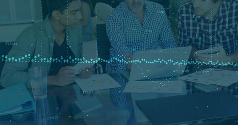 Business Team Collaborates on Financial Data Analysis